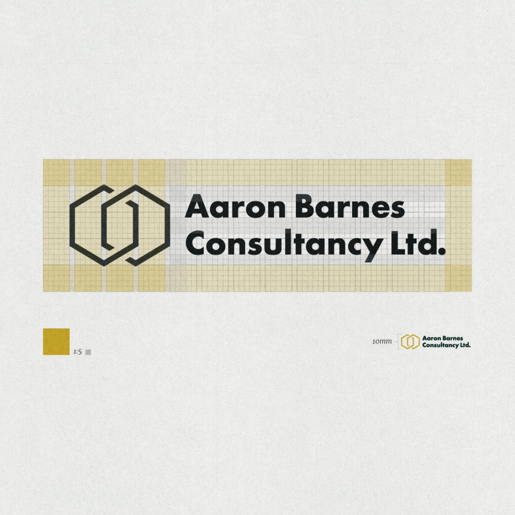 An example of a creative design project: the Aaron Barnes Consultancy logo broken down with proportion guides and a grid.