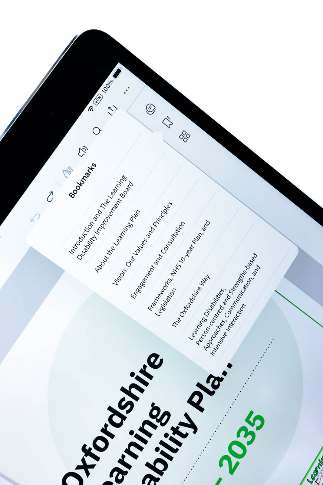 A report is displayed on an iPad. Bookmarks are an example of inclusive digital design. Oxfordshire County Council's Learning Disability features these and many more similar features to maximise inclusivity.